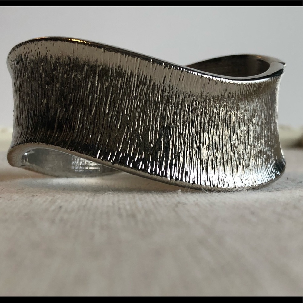 Textured silver tone hinge clasp cuff bracelet